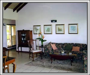 The Sitting Room Has A West Indies Feel - Vacation Villas