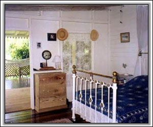 The Bedroom Looks Out On Nevis Peak - West Indies Villas
